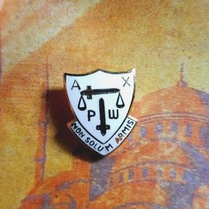 Vintage lapel pin NON SOLUM ARMIS American Ex-Prisoners of War (AXPOW)